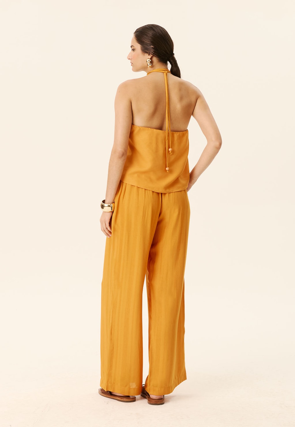 Calça Bolsos Cós Elástico Costas