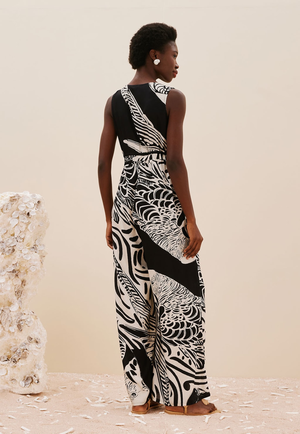 Macacão Decote Profundo Estampado Plume