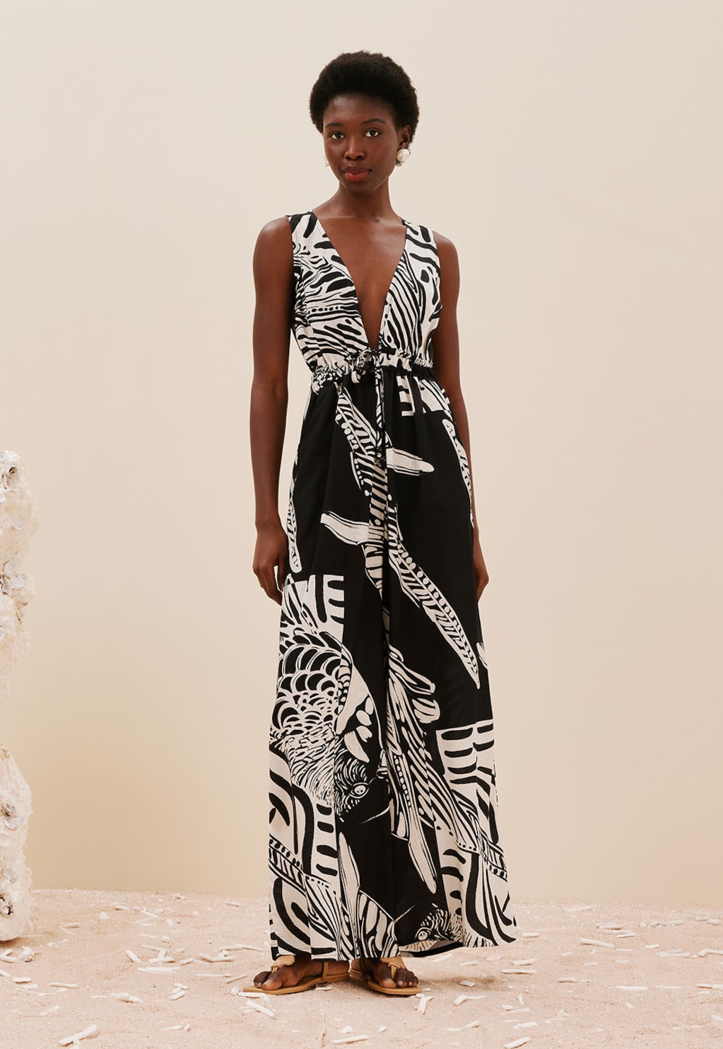 Macacão Decote Profundo Estampado Plume