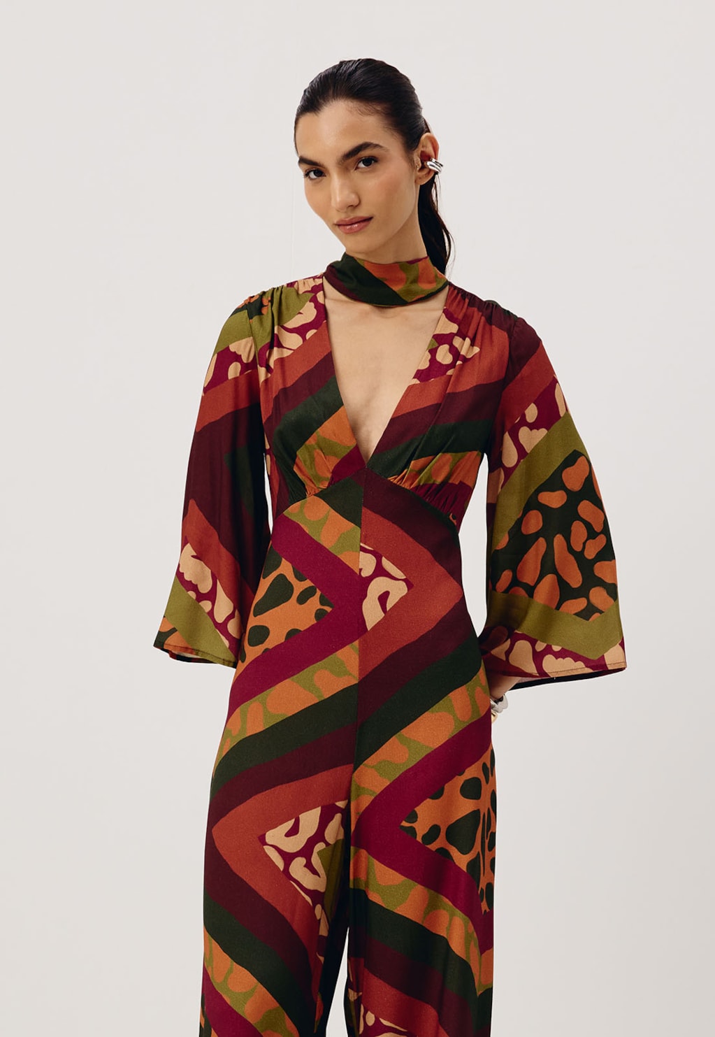 Macacão Gola Alta Estampado Leon