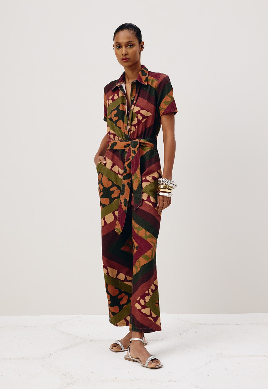 Macacão Sarja Faixa Estampado Leon