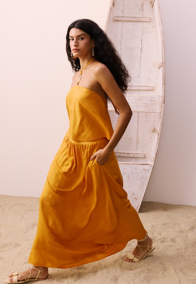 Saia Evasê Midi com Elástico 